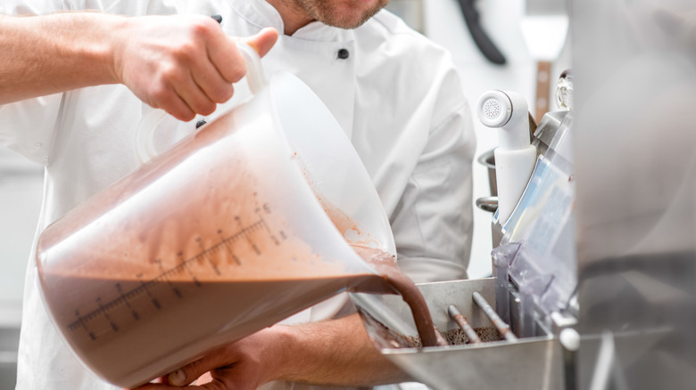 Ice cream mixture poured into machine