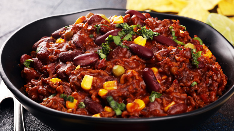 chili with beans and meat in bowl