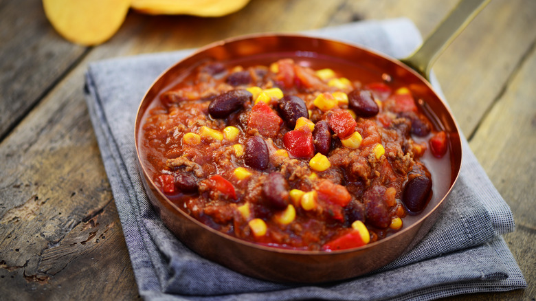 chili with beans and corn in pan