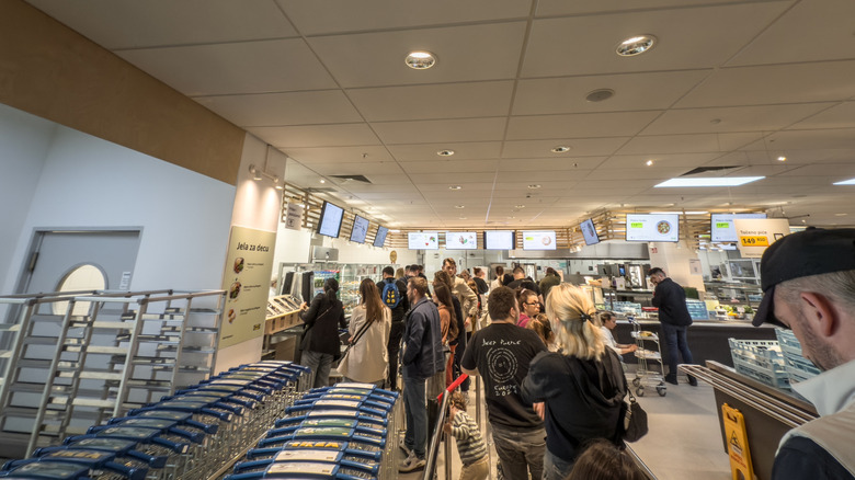 IKEA restaurant in Belgrade, Serbia with people on line to order.