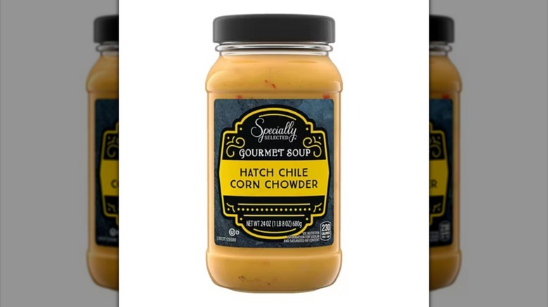 Jar of Specially Selected Hatch Chile Corn Chowder soup against white background.