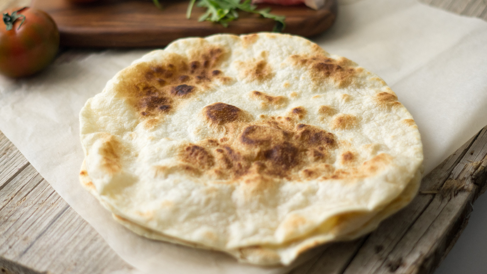 The Parchment Paper Tip To Keep In Mind For Homemade Flatbread