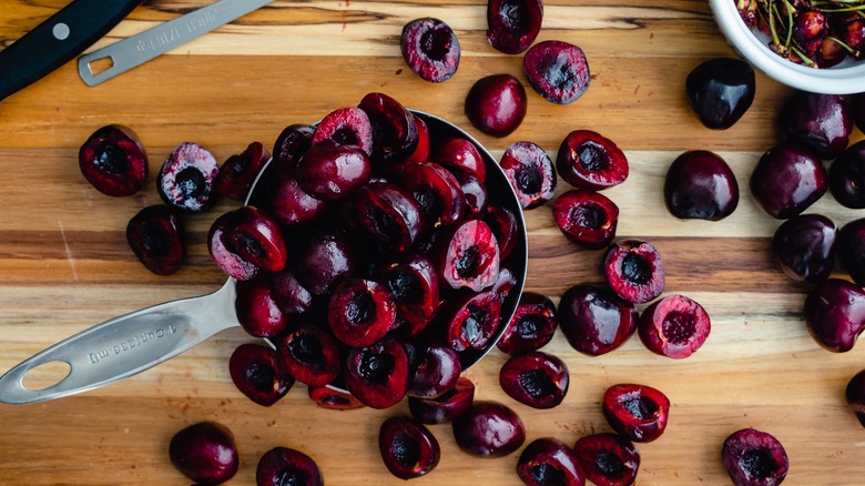 Cherries pitted with a knife 