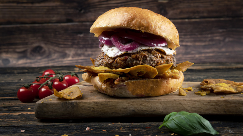 Burger topped with red onion