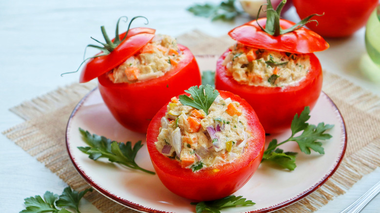tuna salad stuffed tomatoes on plate