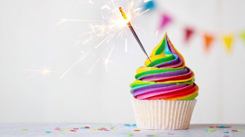 cupcake with swirled rainbow icing 