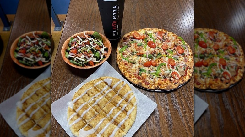 Pie Five Pizza menu items on table