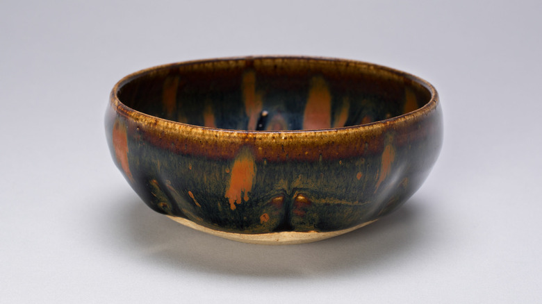 Antique brown and orange bowl