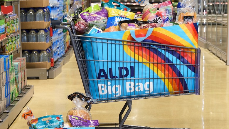 Aldi cart in supermarket aisle