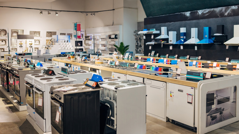 Rows of stoves at an appliance store