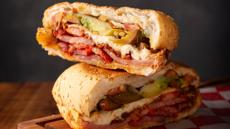 Sandwich filled with cheese and pork