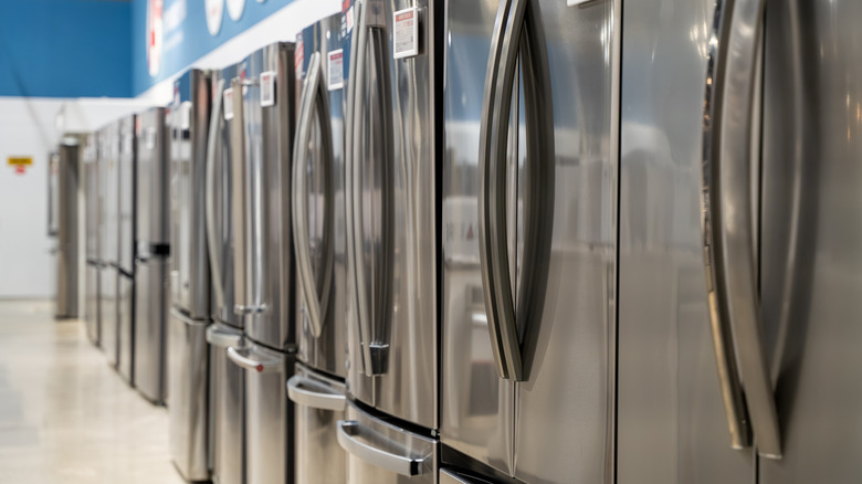 Refrigerators lined up in a store