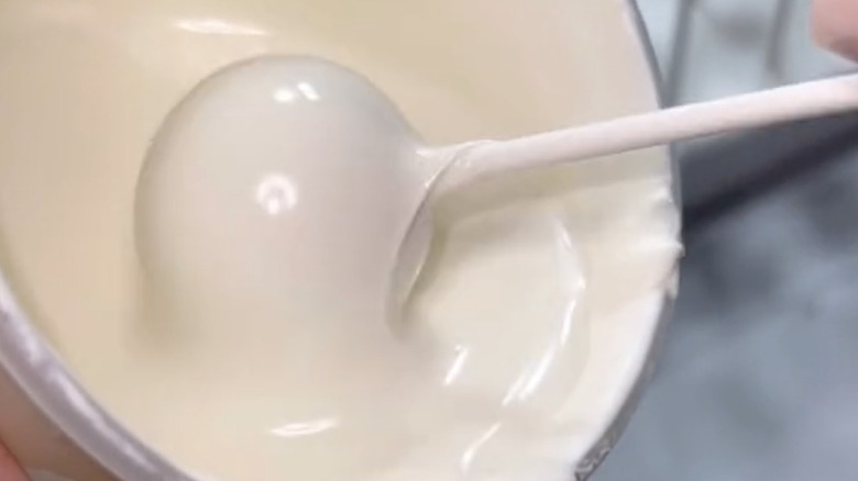 dipping a cake pop on its side