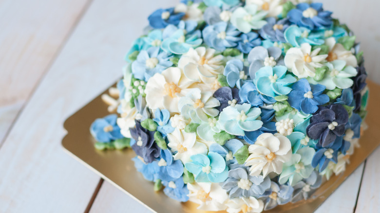 Cake covered in buttercream flowers