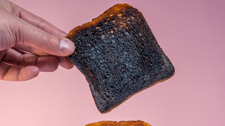 burnt toast coming from toaster