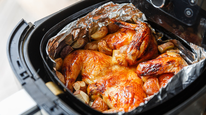 Chicken in an air fryer basket
