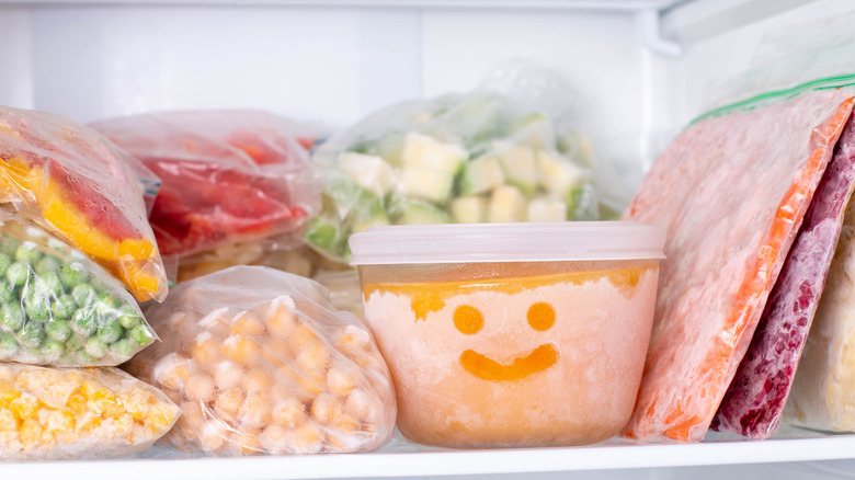 Various freezer foods in plastic containers