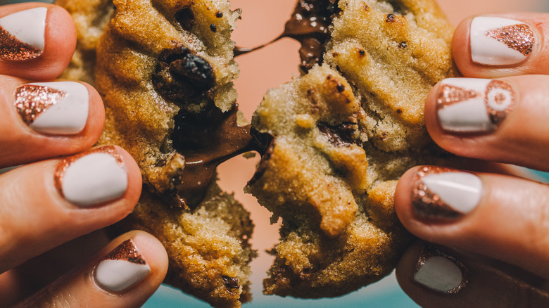 breaking a cookie in half