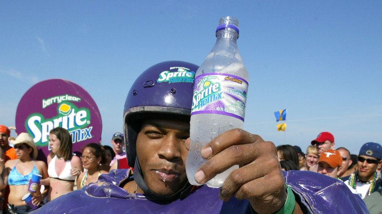 Man holding up sprite remix berryclear