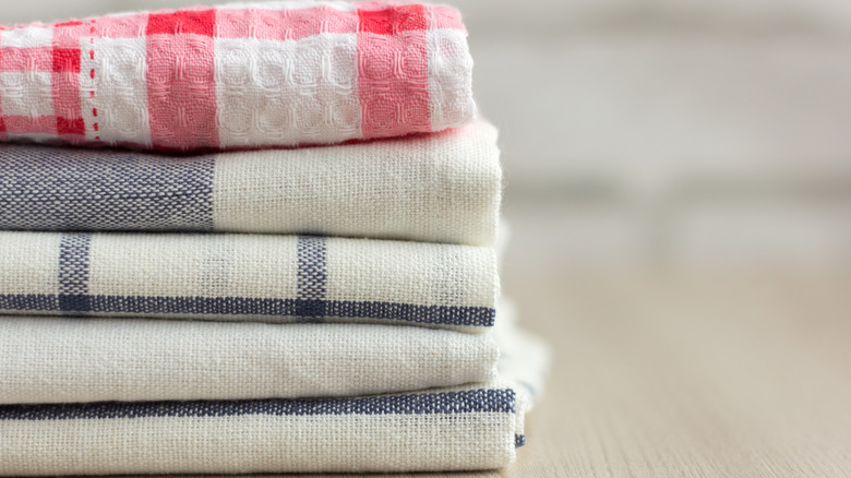 stack of plaid kitchen towels