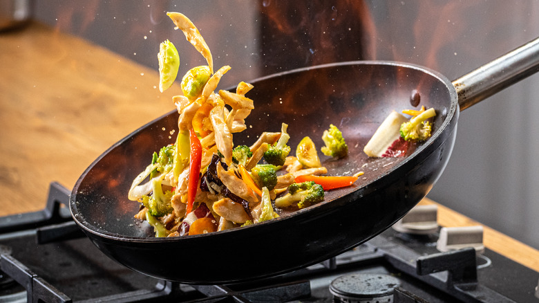 Stir-fry cooking in a wok