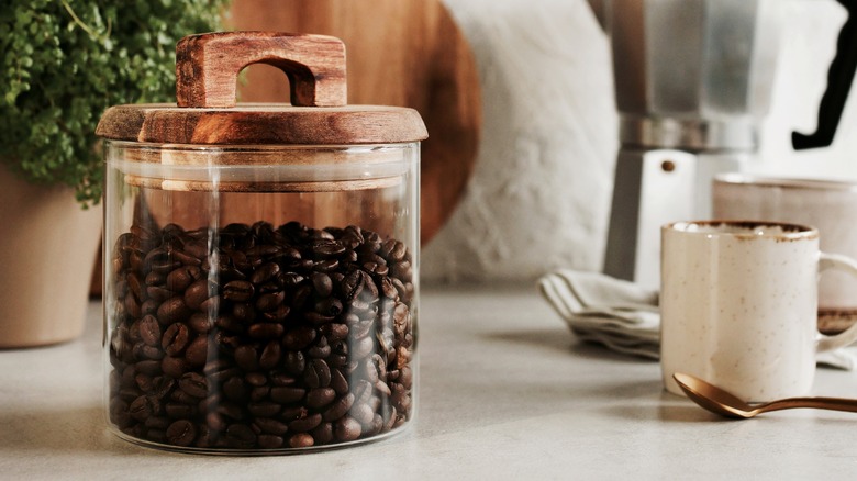Coffee beans in glass container