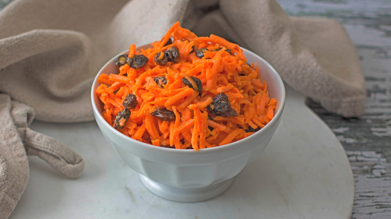 Small bowl of carrot salad with raisins