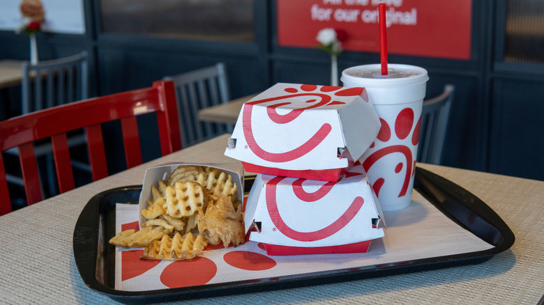 Tray of Chick-fil-A food on table inside restaurant