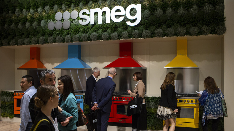 People at the Smeg section of a department store