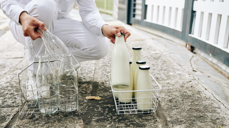 milkman laying down bottles