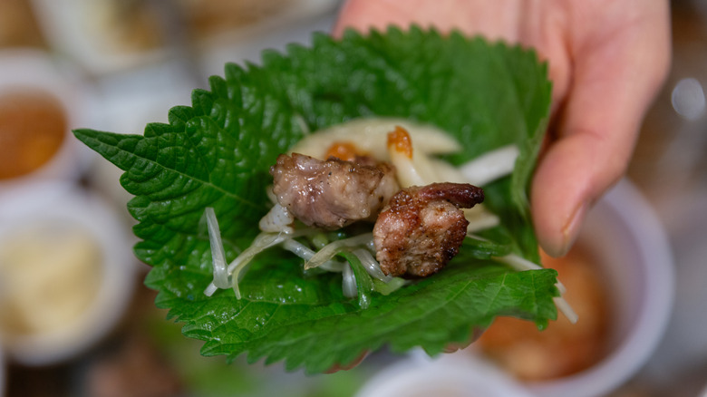 Beef and scallions on a sesame leaf