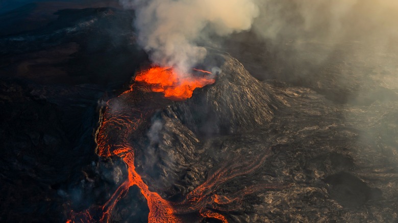 Erupting volcano aerial view