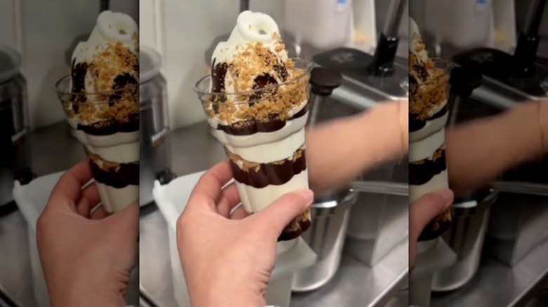 Hand holding s'mores parfait