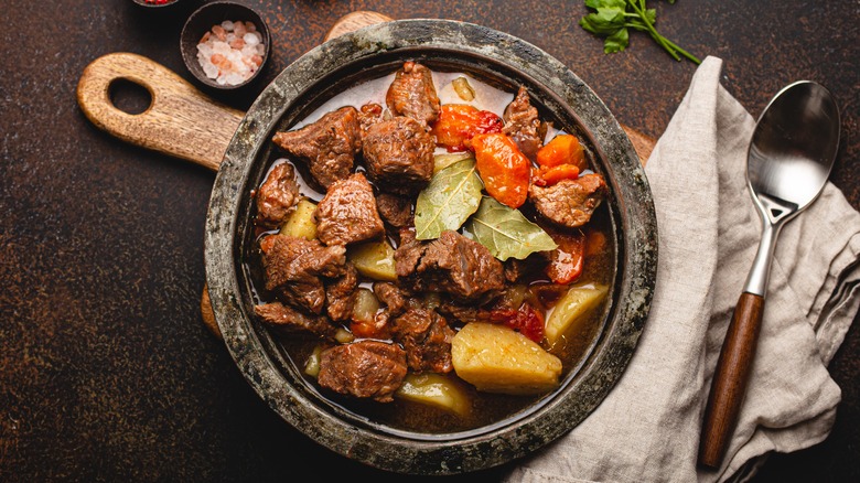 Beef stew in rustic pot