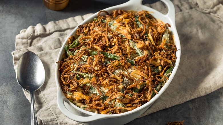green bean casserole baked in white dish