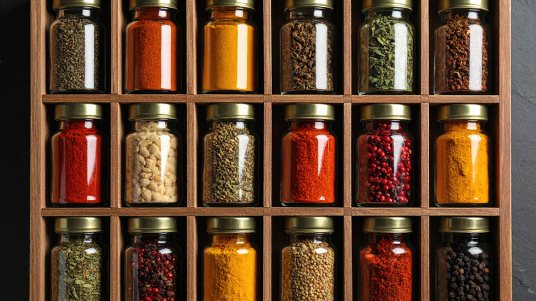 Spices in a wooden rack