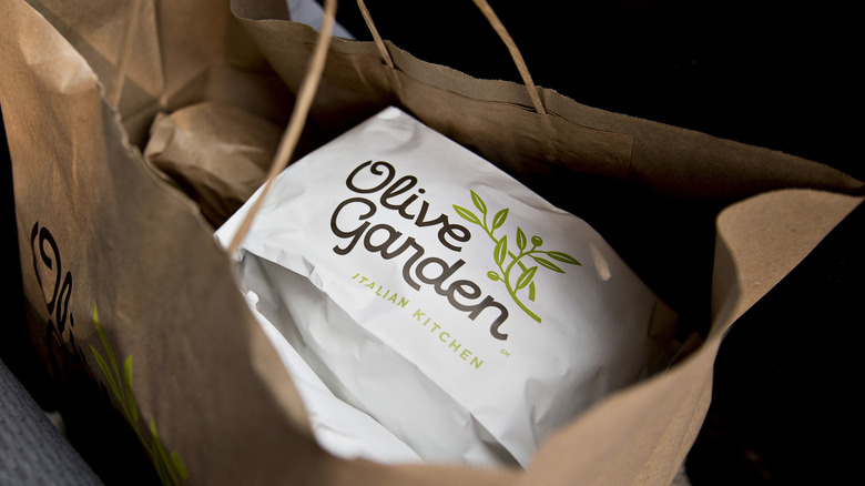 olive garden food in brown bag
