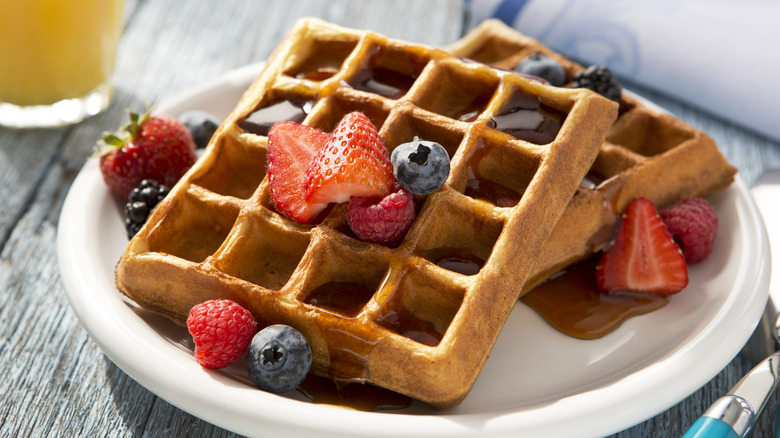 waffles with berries and syrup