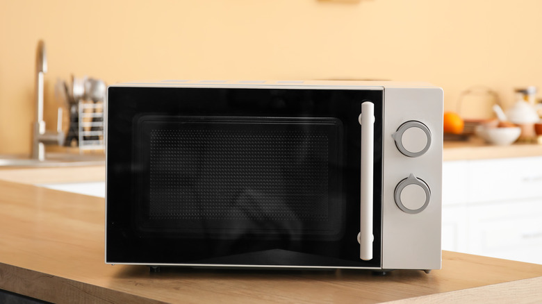A microwave on a kitchen counter
