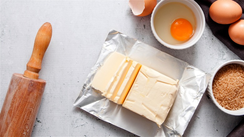 Package of opened butter half-sliced