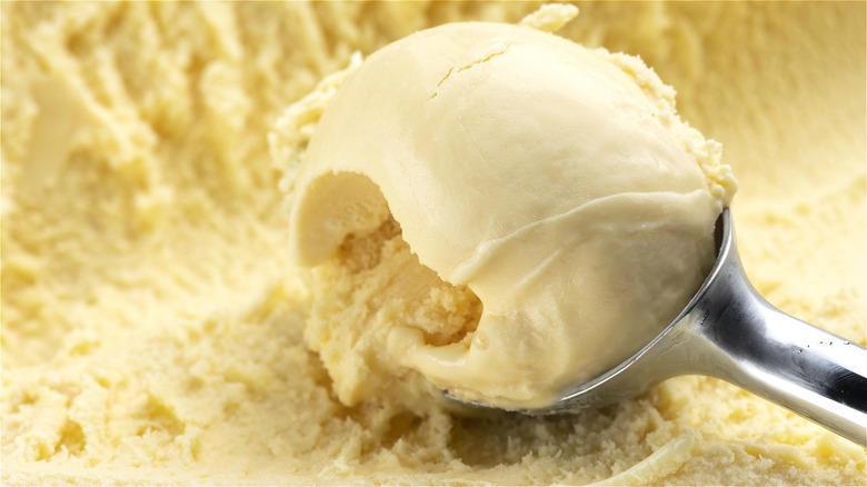 Vanilla ice cream with silver scoop