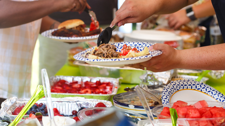 People taking picnic food