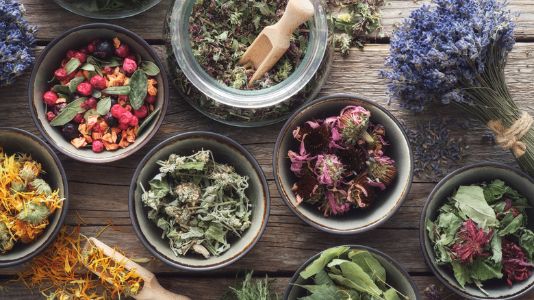 Herbs for tea inside of glass jars