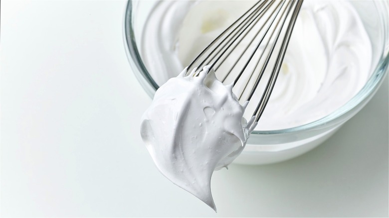 Whipped cream on whisk