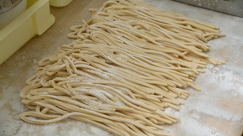 fresh-cut noodles dusted with flour