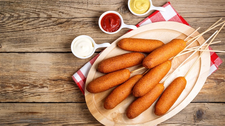 Corn dogs on a plate