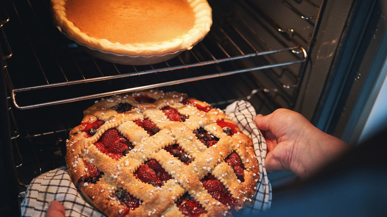pumpkin and berry pies in the oven