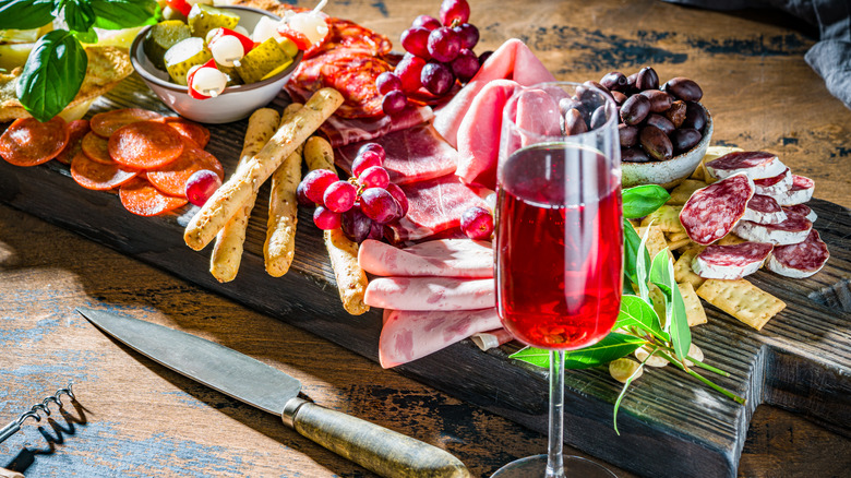 charcuterie board and red wine