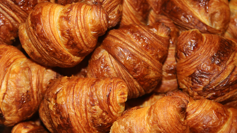pile of fresh, flaky croissants
