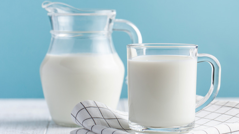 Pitcher and glass of milk